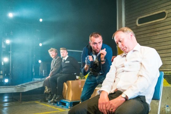 Michael Moreland, Ross Baxter, Ewan Donald and Barrie Hunter in a scene from Dundee Rep's Gagarin Way.