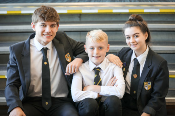 Arbroath Academy pupils Igor Spurek, Rory Cargill and Beth Ritchie are working on the mentoring programme.