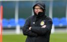 A well wrapped-up Alex McLeish takes training at Oriam near Edinburgh.