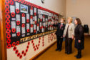 Cameron Stuart, Mrs Linda Nicoll and the Rev Annette Gordon with the display.