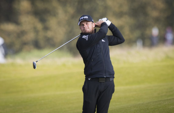 Tyrrell Hatton playing at Kingsbarns yesterday.