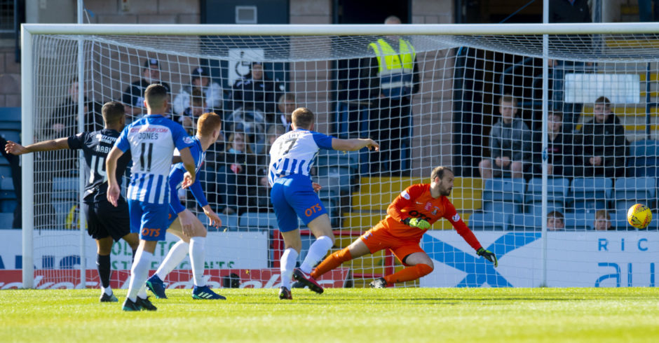 Adil Nabi opens the scoring at Dens.