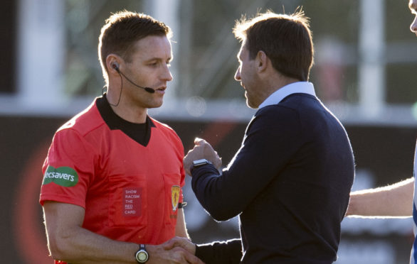 Dundee manager Neil McCann (right) remonstrates with referee Steven McLean at full time.