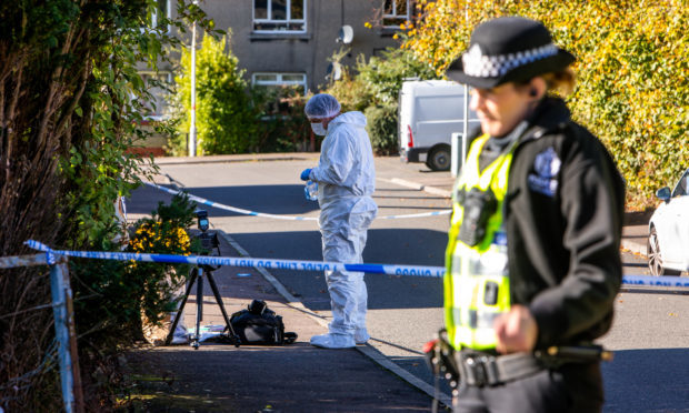 Police on scene gather evidence at the scene in Blairhall.