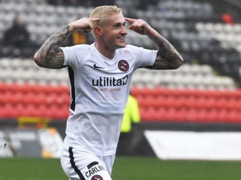 Fraser Aird celebrates his goal.