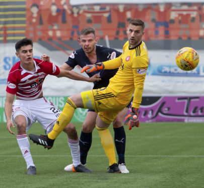 Andy Boyle scores Dundee's opening goal at Hamilton.