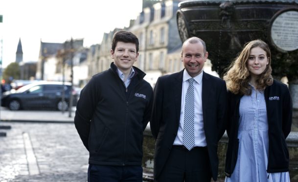 Brian Thomson (centre) with Frazer Towers and Rose Meier from Playfair Consultancy Group