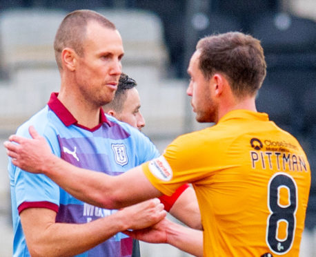 Kenny Miller with Scott Pitman at full-time.