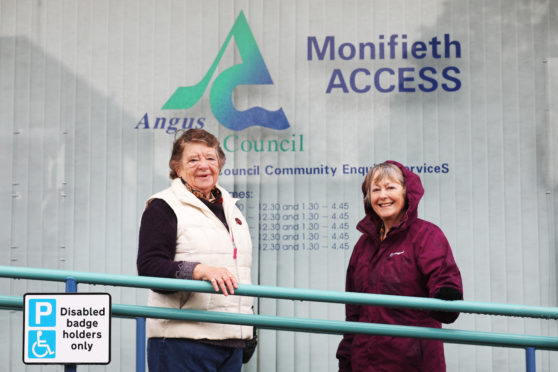 Margaret Copland, president of Monifieth Local History Society, and Marianne Buultjens, acting secretary, outside the former Access office.