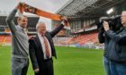 Dundee United chairman Mike Martin parades new manager Robbie Neilson in front of the media at Tannadice Park.