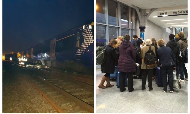 A photo from the scene near Stonehaven/passengers gathered following the cancellations at Dundee Station.