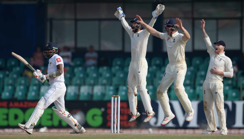 Suranga Lakmal of Sri Lanka is dismissed as Ben Foakes, Keaton Jennings and Ben Stokes celebrate as England defeated Sri Lanka 3-0 in the series after they won the  3rd Cricket Test Match between Sri Lanka and England at the Sinhalese Sports Club Ground.