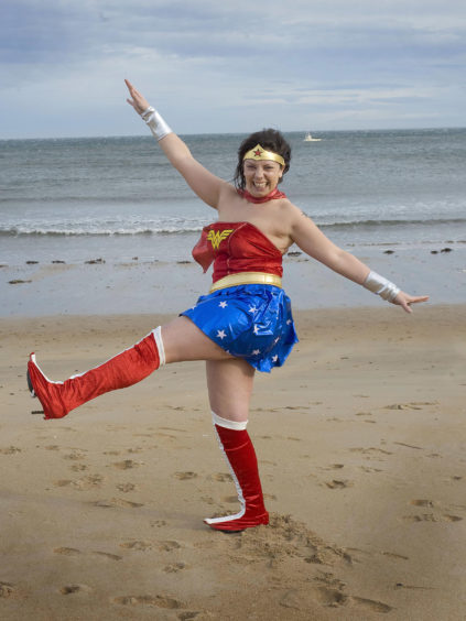 Children In Need hit East Sands in St Andrews thanks to Wonder Woman—alias Claire Maindron.

Claire, who worked at the refreshment kiosk at the East Sands donned the costume to raise money.