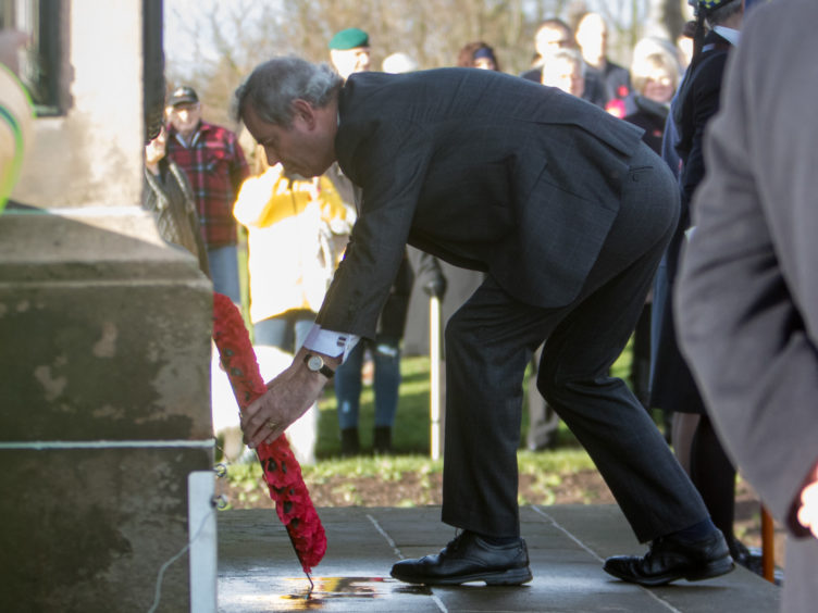 A wreath is laid in Arbroath.