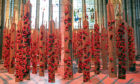 Poppies attached to puttees, leg wrappings worn by soldiers during World War 1, hang down in the Morning Chapel inside Salisbury Cathedral, ahead of the reading of Royal Artillery's Armistice Roll of Honour.