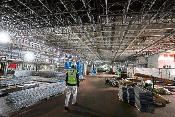Work continues in the hanger area during a tour of the under-construction aircraft carrier, HMS Prince of Wales, at BAE Systems in Rosyth, Fife. PRESS ASSOCIATION