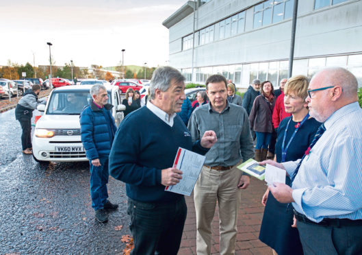 Angus parking charge protesters during their noisy demo at council HQ in Forfar.