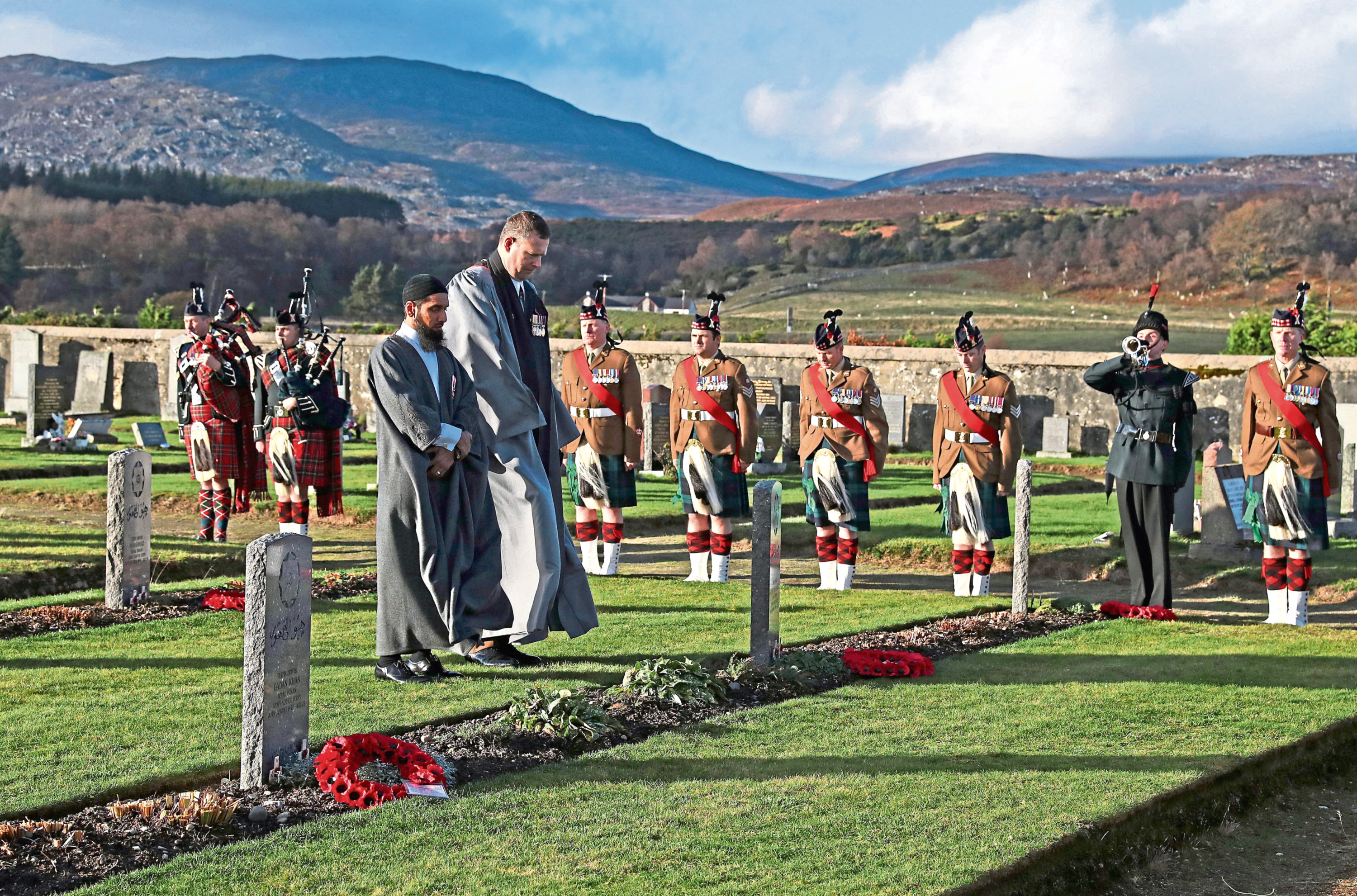 Iman Asim Hafiz and the Rev Duncan MacPherson attend Scotland's first multi-faith remembrance service for British Indian Army soldiers at Kingussie Cemetery in Badenoch on Thursday November 15.