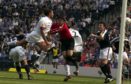 Lorenzo Amoruso (left) rises above the Dundee defence to head the winning goal of the match in 2003.