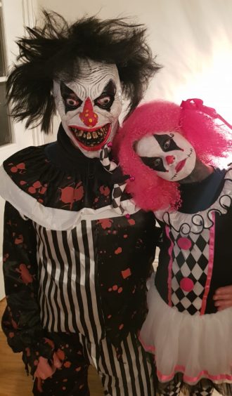 The very scary "daddy and daughter clown" duo, Stevie and Megan.