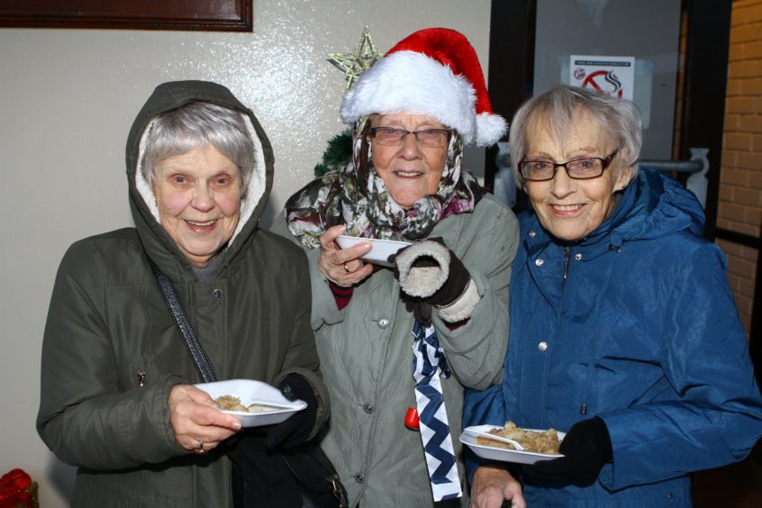 The Monifieth xmas lights switch on over the weekend.   Margaret Whyte,Evelyn Petrie & Edna Ross enjoying some stovies.