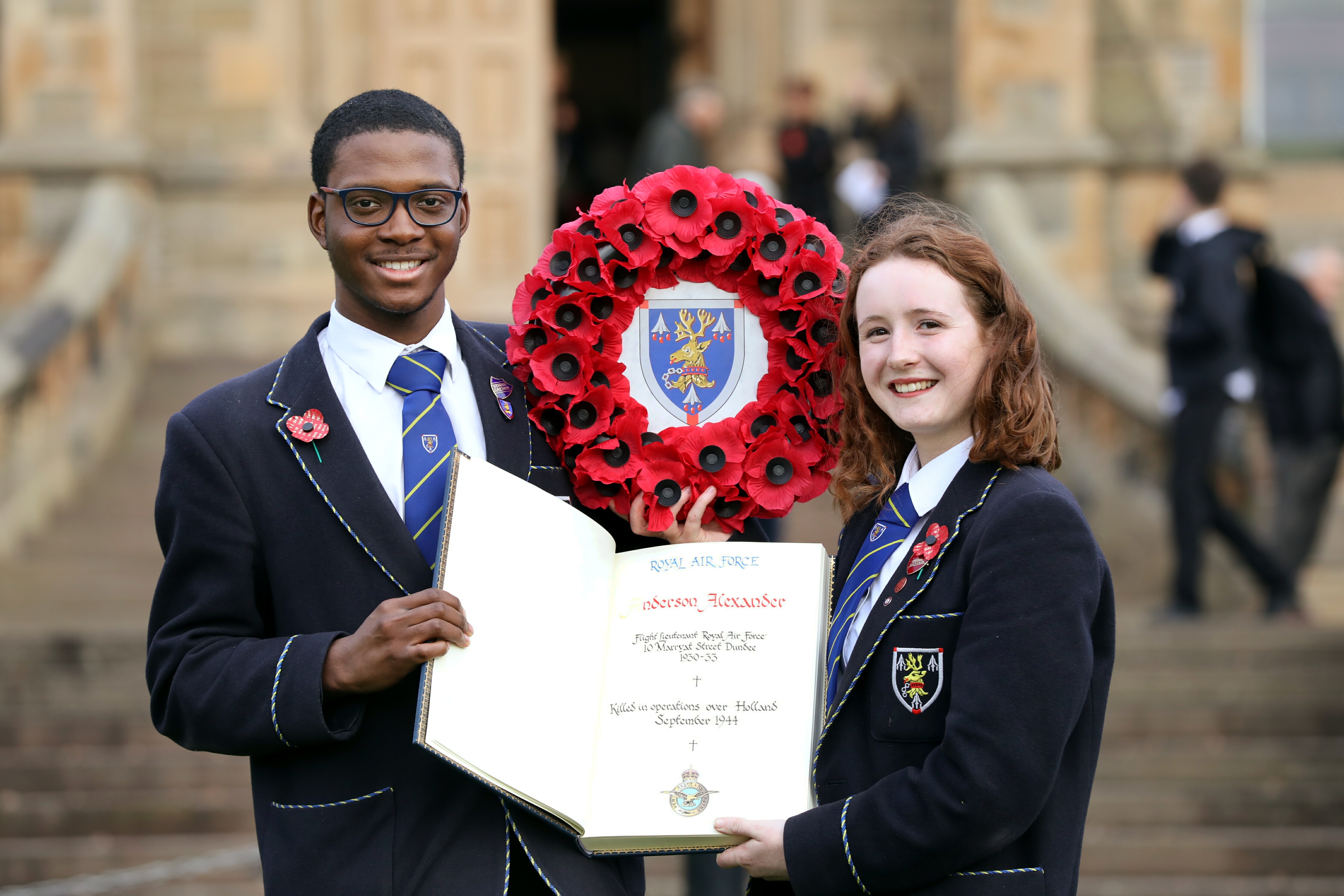 Head boy Ebu Omenuko and head girl Robyn White with the book ahead of the ceremony