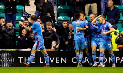 Paul McGowan and the Dundee players celebrate the equaliser.