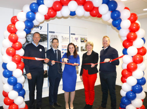 Celebrations as Tesco's Dundee customer engagement centre   following completion of a multi-million pound revamp. Picture shows Public Finance Minister Kate Forbes MSP cutting the ribbon.