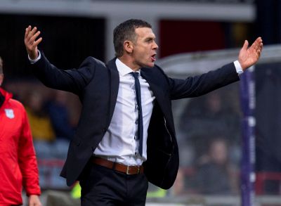 Jim McIntyre on the touchline.