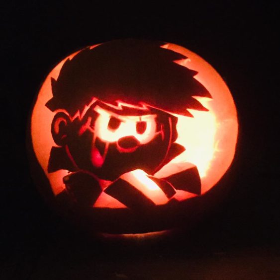 Not a costume, but we loved Joanna Hay's photo of a Dennis the Menace pumpkin.