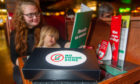Mum Ashleigh Fergus and daughter Rosie McPherson enjoy a phone free dinner in the Overgate Frankie and Benny's.