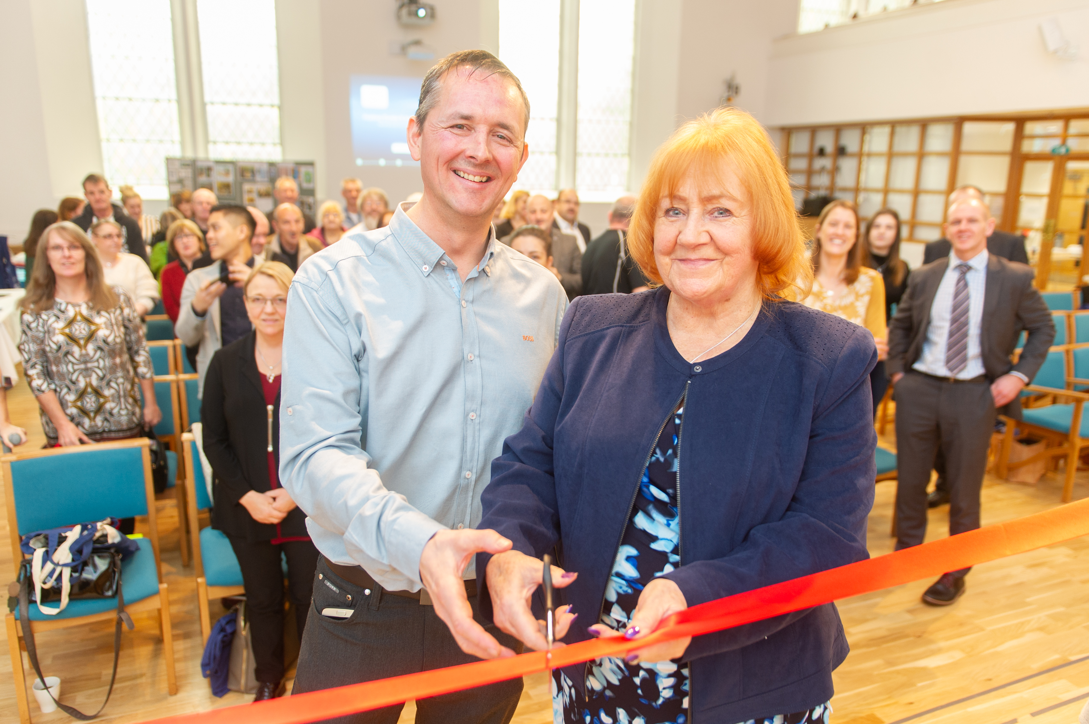 Colin Robertson performs the ribbon-cutting duties alongside Baillie Helen Wright.