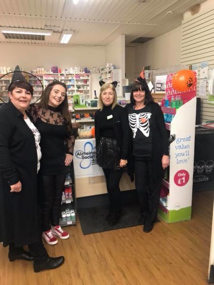 Even the staff at Lloyds Pharmacy in Lochee got involved - all in the name of fundraising.