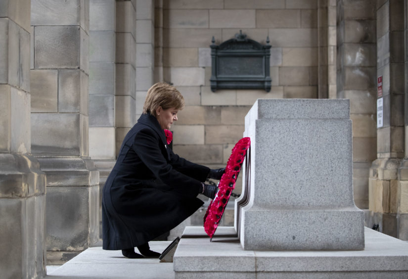 First Minister Nicola Sturgeon lays a wreath at the Stone of Remembrance at the City Chambers, Edinburgh, on the 100th anniversary of the signing of the Armistice which marked the end of the First World War.