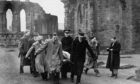 The Stone of Scone - the Scottish Stone of Destiny - missing from Westminster Abbey since Christmas Day, 1950 - being removed from Abroath Abbey, Forfarshire, Scotland after being handed to the Custodian of the Abbey James Wiseheart by Scottish Nationalists.