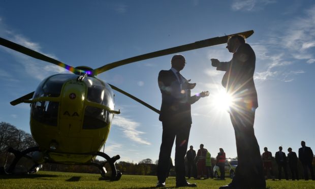 Pictured is SCAA founding Chairman John Bullough (right) and Chair of Scottish Ambulance Service Tom Steele in Aberdeen.