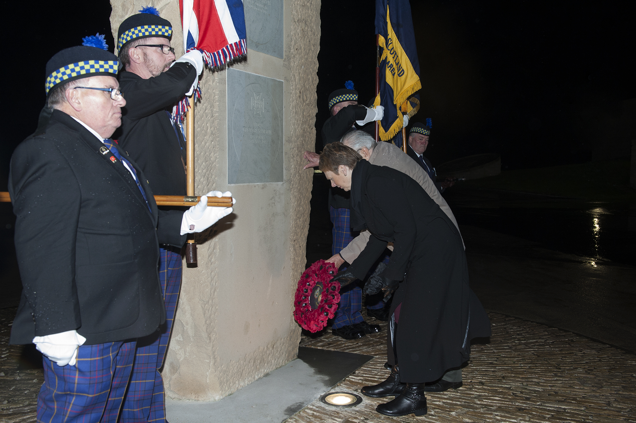 Carol MacDonald lays a wreath at the memorial to the Carnoustie VCs
