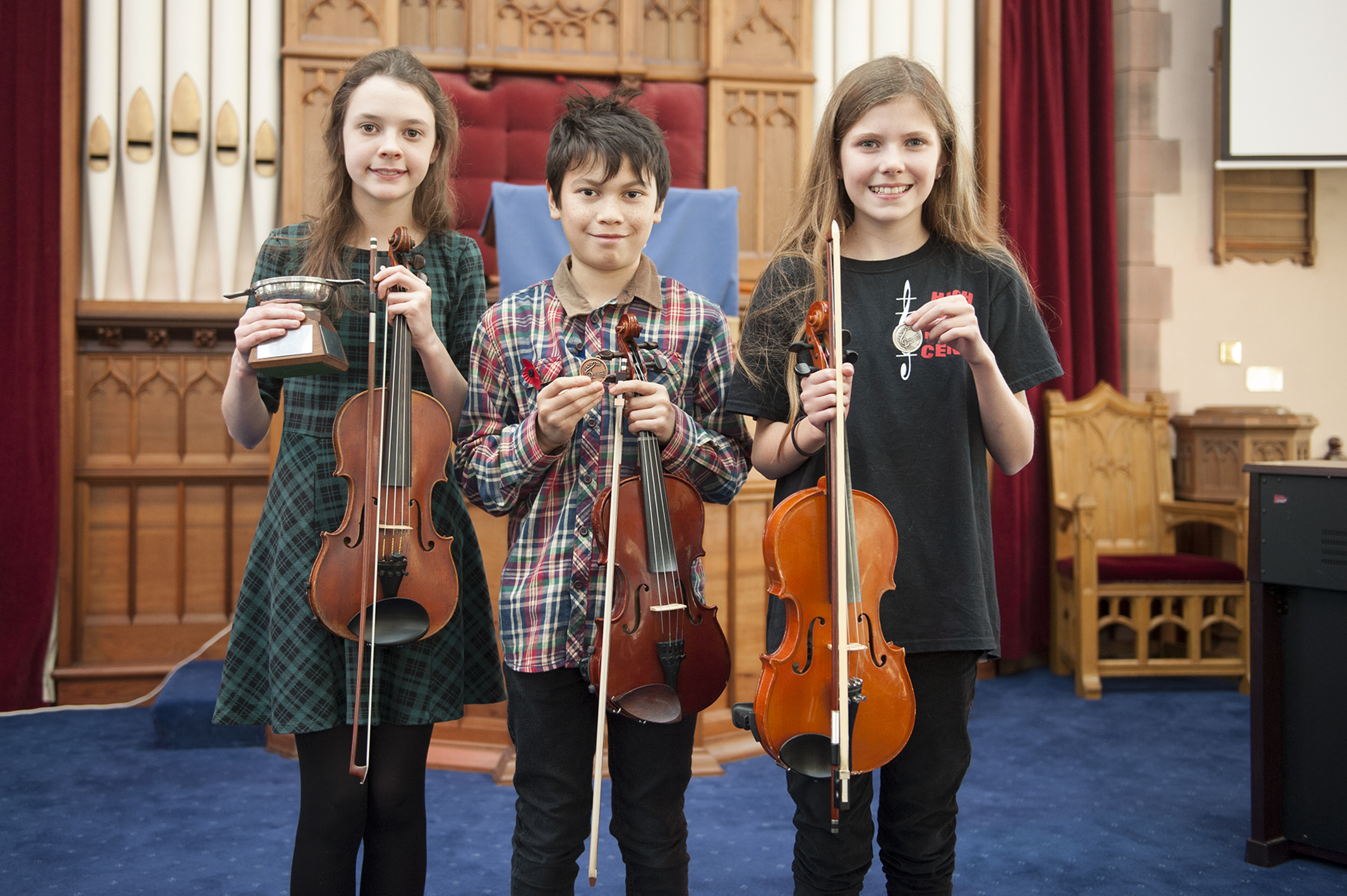 Caption (description) -  CR0004434, The  Angus Strathspey & Reel Society’s,  51st  Traditional Fiddle Festival, Picture shows, l to r, Group 1 winner Charlotte Slater from Ellon, Murray Todd from Shetlands and Holly Stephen from the Shetlands, 10 November 2018