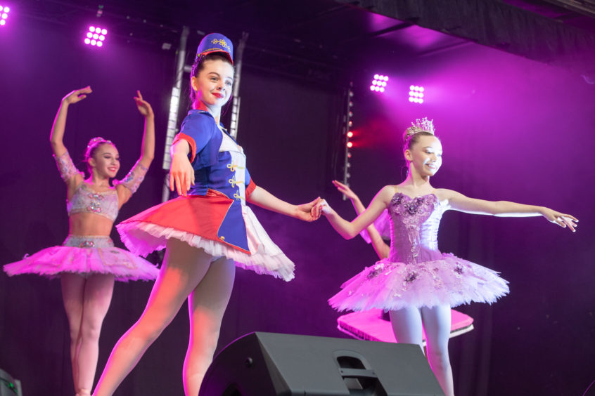 The dancers from the Julie Young School of Dance perform on the Year of the Young People Stage.
