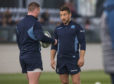 Scotland's Greig Laidlaw admits he sometimes "gives a little look" to keep Finn Russell in check.