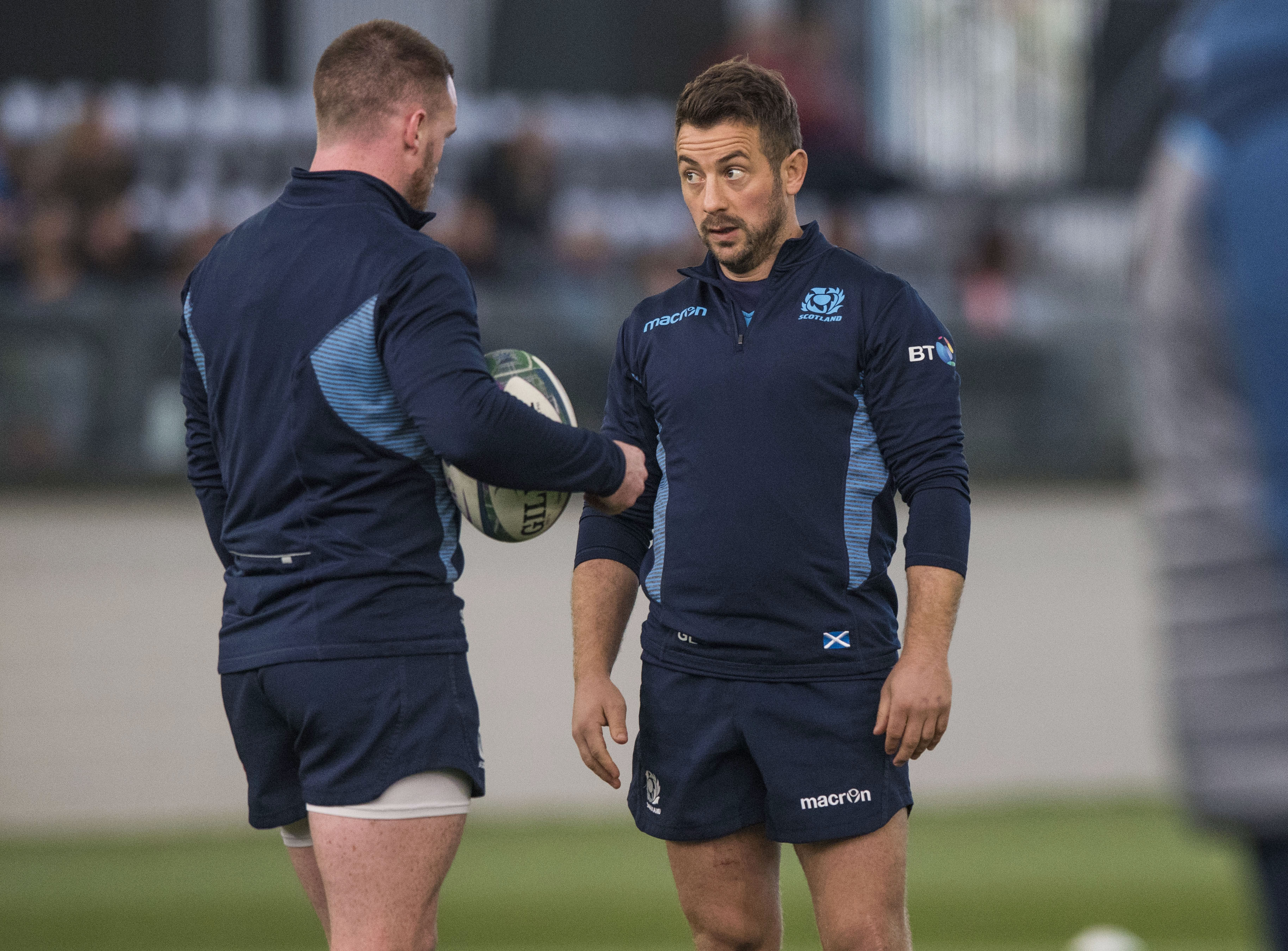 Scotland's Greig Laidlaw admits he sometimes "gives a little look" to keep Finn Russell in check.