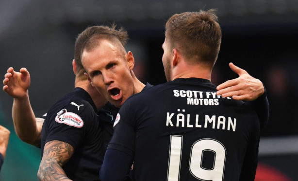 Kenny Miller celebrates his goal with Benjamin Kallman.