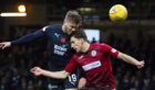 Benjamin Kallman in action for Dundee against St Mirren.