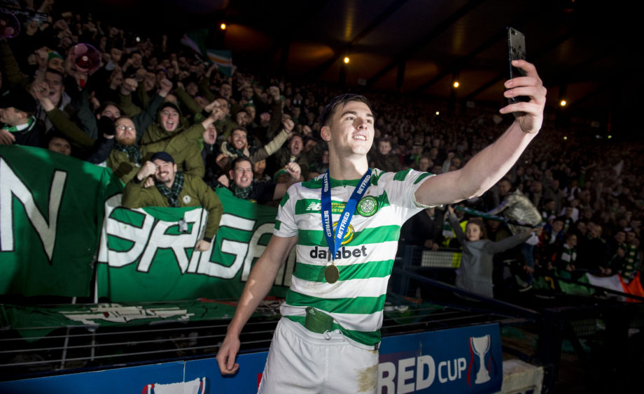 Celtic's Kieran Tierney at full time with the fans.