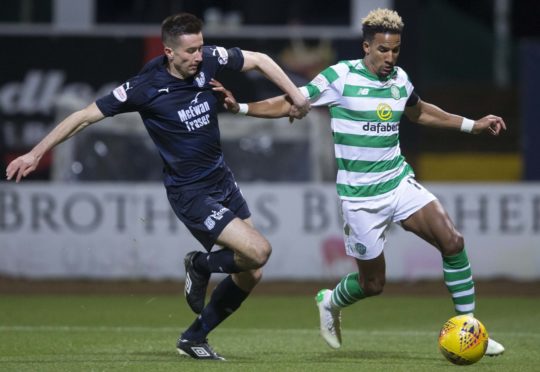 Cammy Kerr challenges Celtic winger Scott Sinclair on Wednesday night.