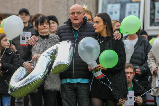 Allan Bryant's father Allan, mother Marie and sister Amy released balloons in his name