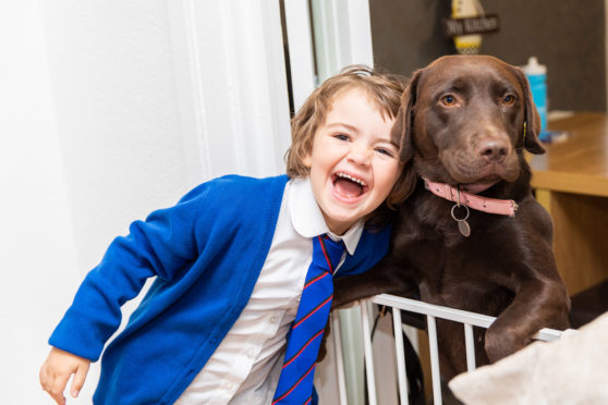 Ava Stark and her dog, Lola.