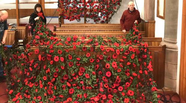 Working on the poppy display inside the Kirk