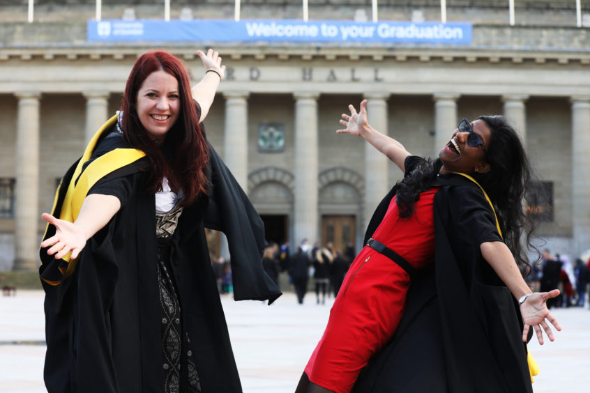 Birgit Mischak, 29 graduating with a Masters in International Buisness and Raveena Meembat, 25, graduates with a Masters in Forensics, Anthropologie and Archaeology.
