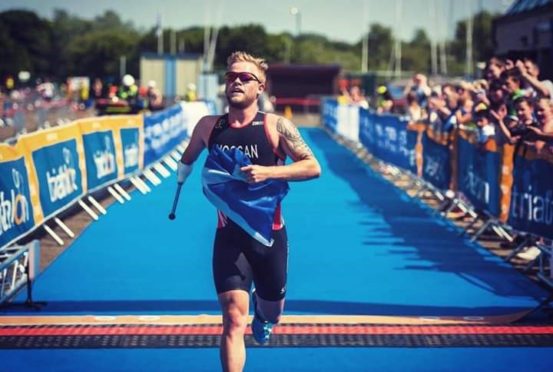 Stefan competing in the triathlon for Great Britain